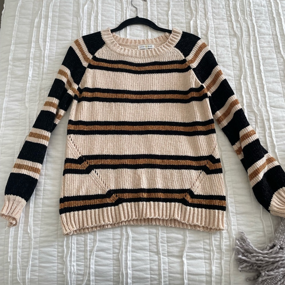 Cream, black & white knit sweater. Very soft material.